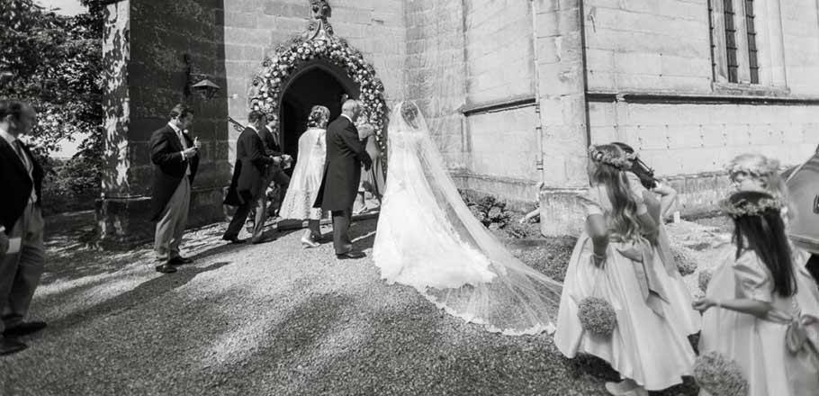 bridal party entering the chapel at Birdsall 