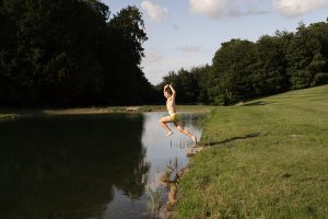 man jumping into the lake at Birdsall