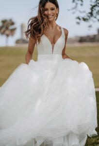 Bride in sleeveless wedding dress 